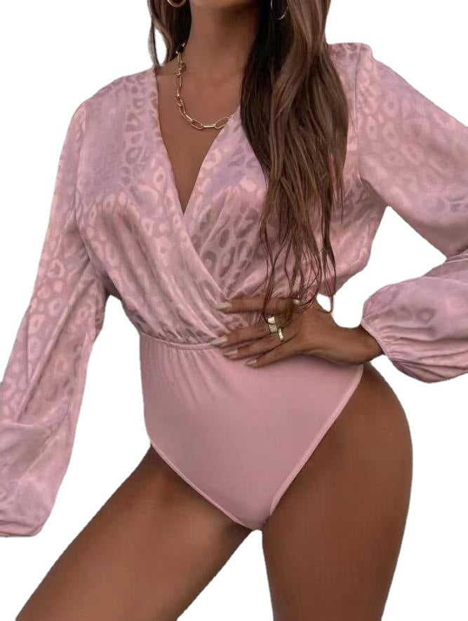 Dame bodysuit med elegant indpakningsudskæring og voluminøse ærmer Skovae
