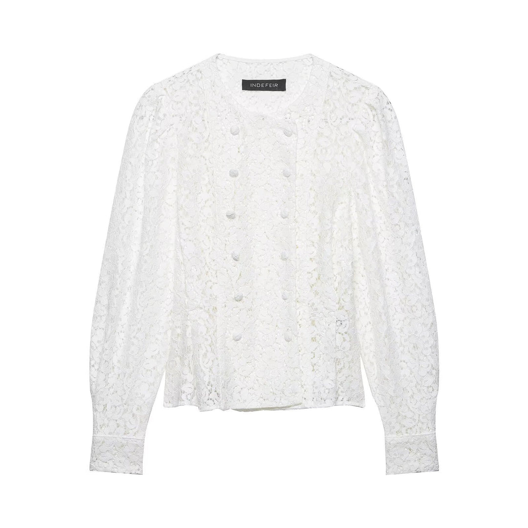Dame spidsbluse med dekorative knapper og elegant pasform Skovae