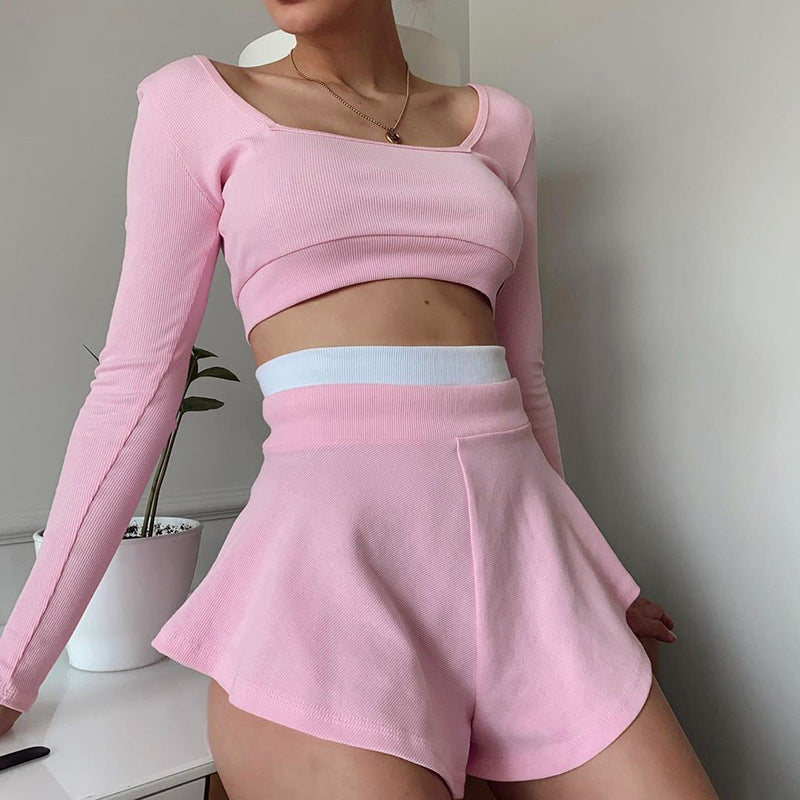 Dame smart Crop-Top med lange ærmer og svingende shorts Stilla