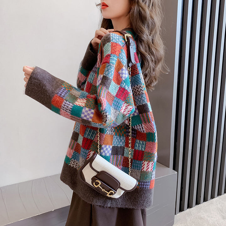 Dame stilfuld sweater med ternet mønster og casual snit Stilla