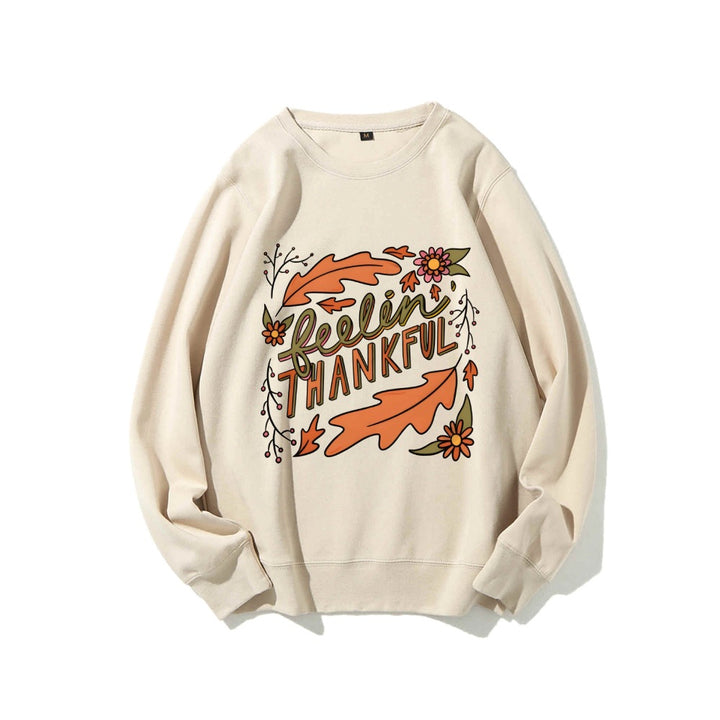 Kvinders sweatshirt med farverigt efterårsdesign og inspirerende tekst Stilla