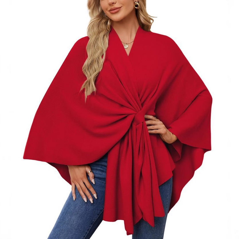 Dame elegant strikkeponcho med raffinerede draperinger og taljebælte Stilla
