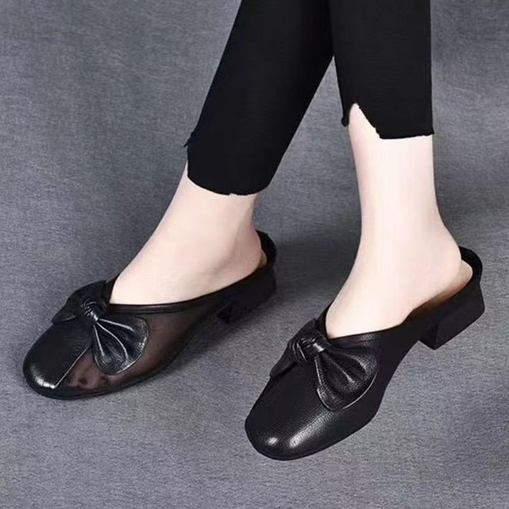 Dame elegante mules med moderigtigt sløjfedetalje og komfortabel blokhæl Stilla