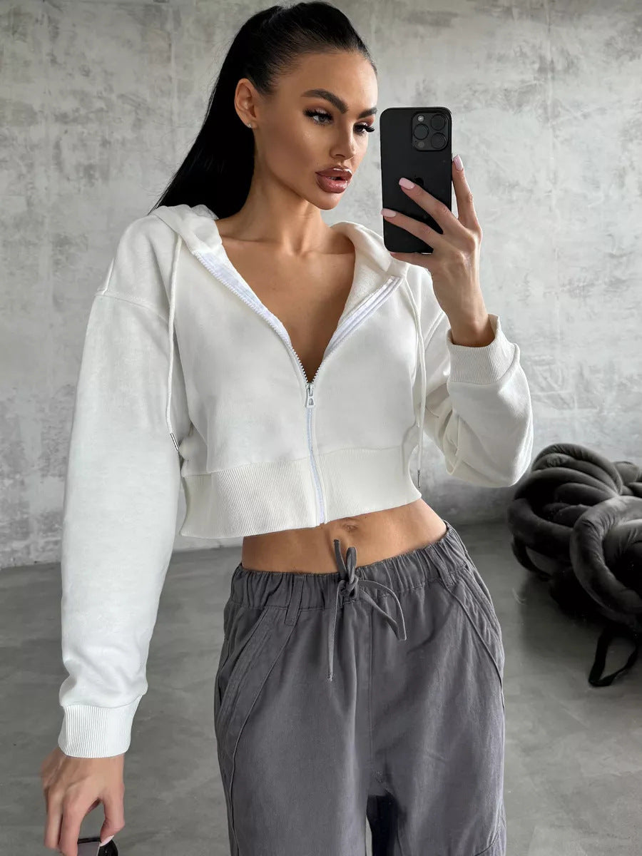 Kvinders cropped hoodie med lynlås og sidelommer Skovae
