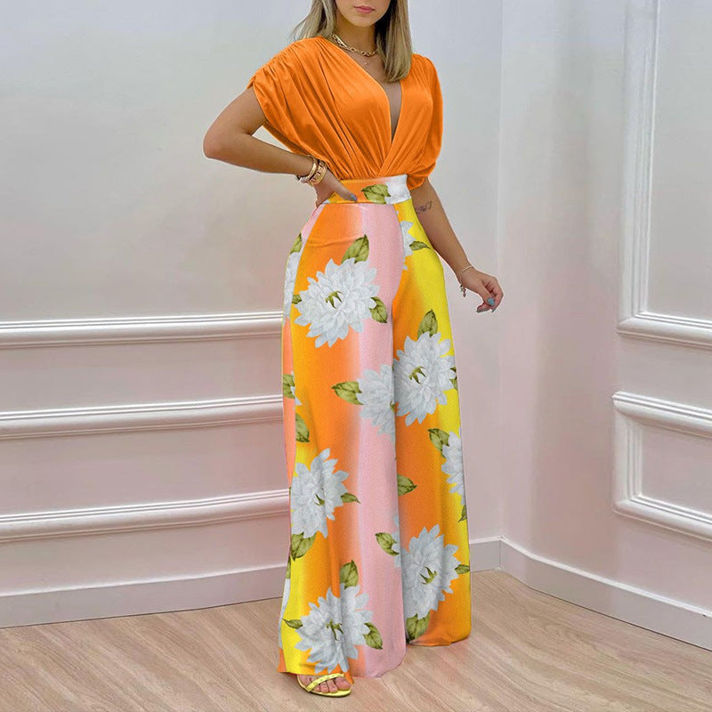 Damer Elegant Jumpsuit med Dyb V-Hals og Bred Skåret Ben Stilla