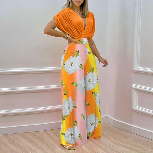 Damer Elegant Jumpsuit med Dyb V-Hals og Bred Skåret Ben Stilla