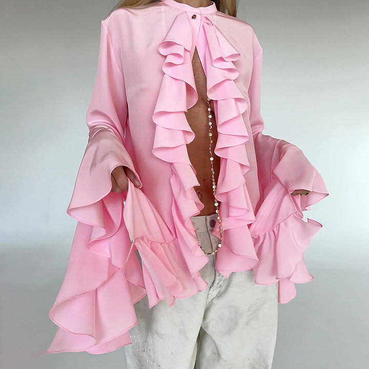 Damebluse med voluminøse flæser og elegante trompetærmer Stilla