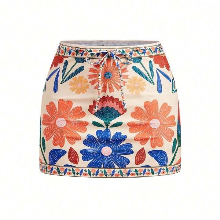 Dame badedragt med et floralt design og aftagelig nederdel Skovae