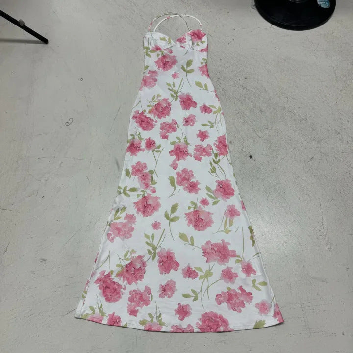 Dame maxikjole med delikat blomsterprint og dyb V-udskæring Skovae
