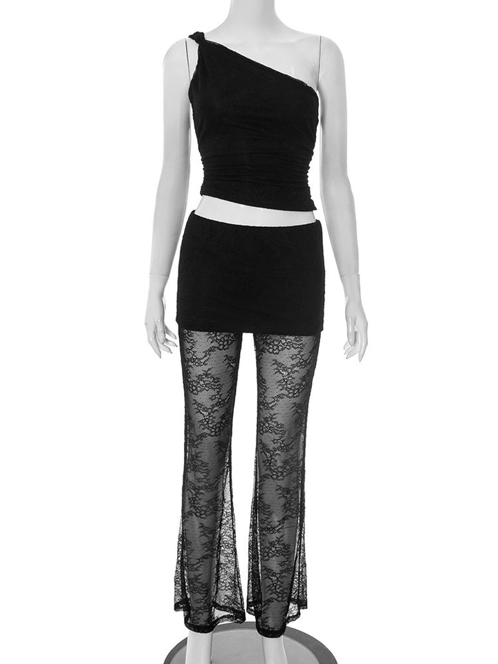 Dame asymmetrisk top med elegant spidsdetaljer og figursyede leggings Skovae