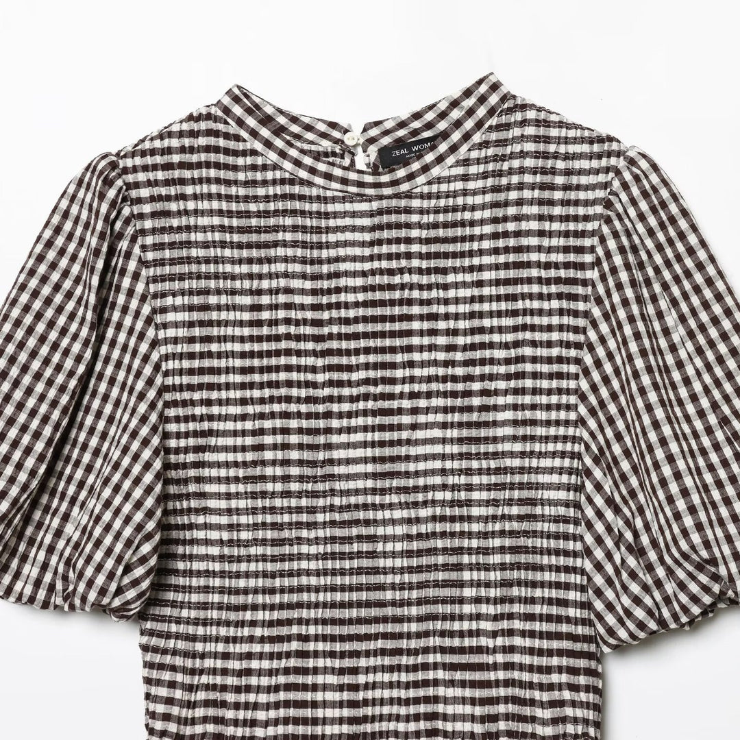 Damebluse med dekorative puffærmer og smidig rynkesilhouette Skovae