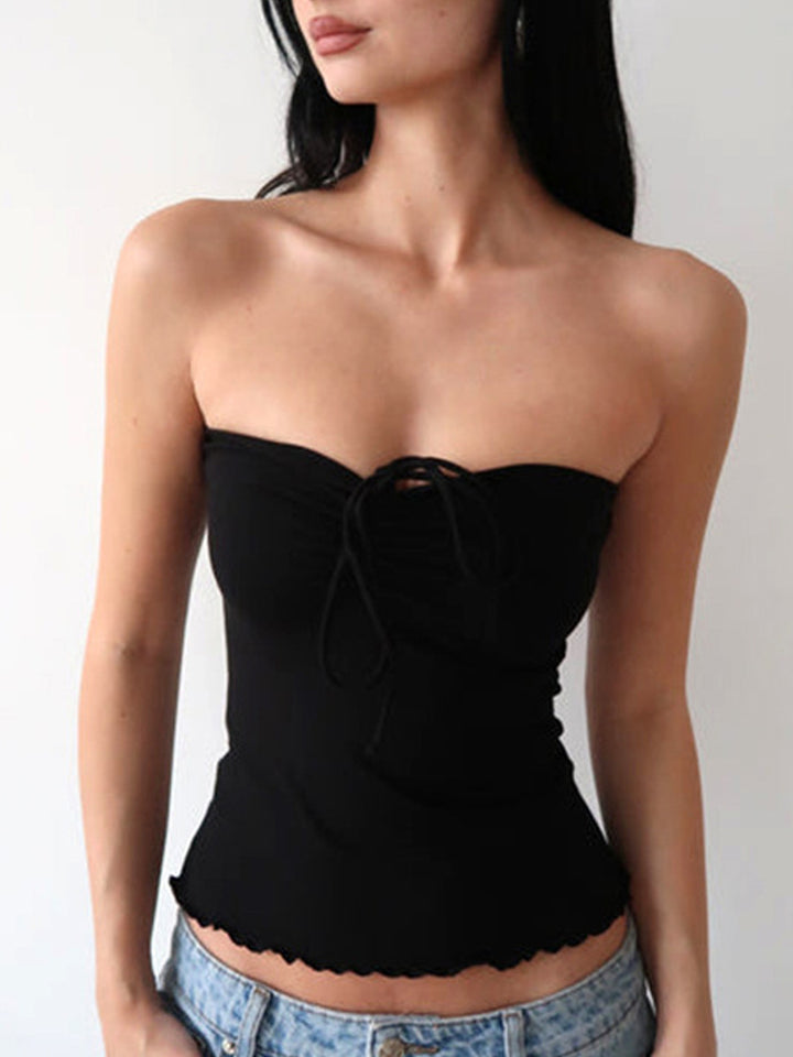 Dame bandeau-top med fine ruffle-detaljer og justerbare stropper Skovae