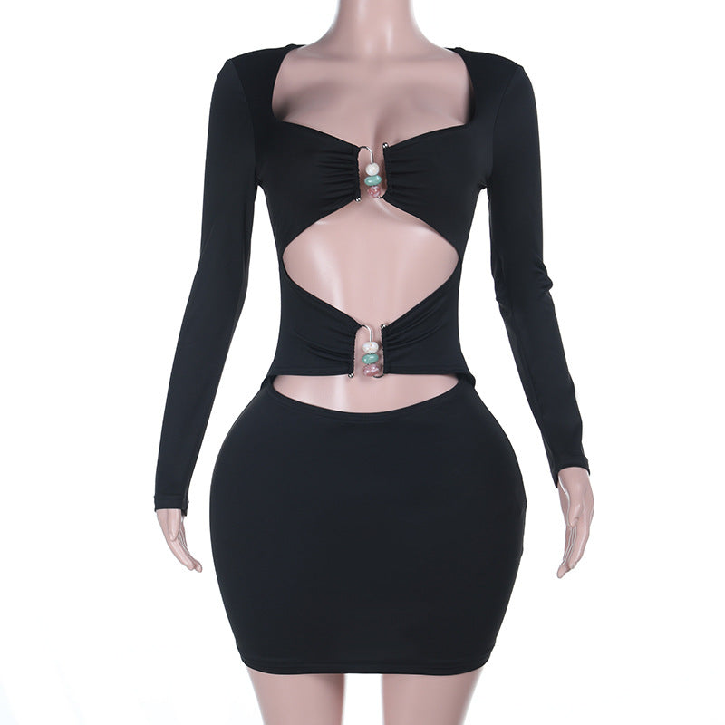 Dame figursyet minikjole med stilfulde cut-outs og elegante dekorelementer Skovae