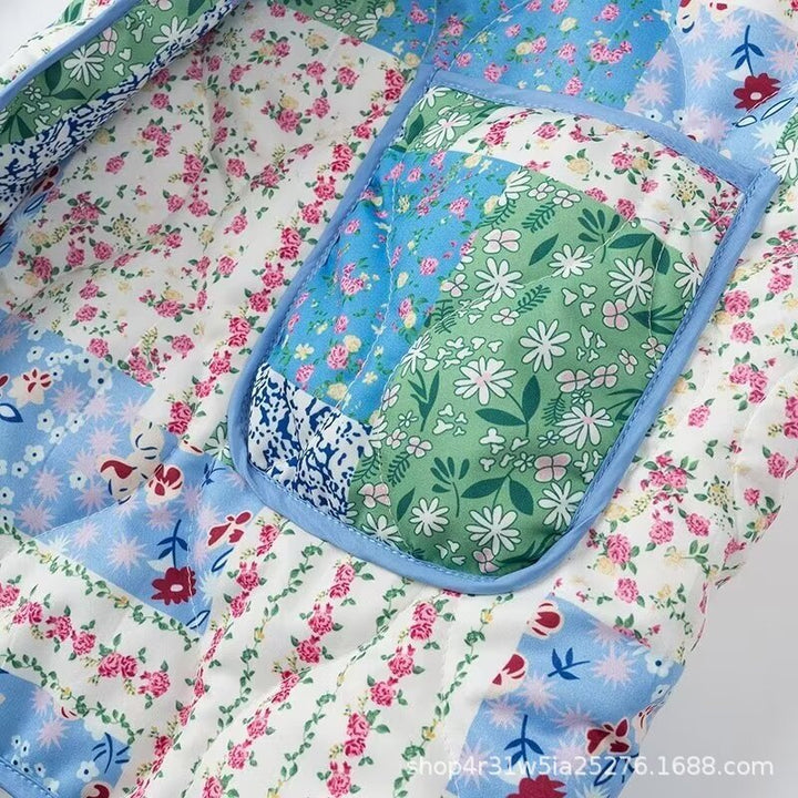 Dame Patchwork Polstret Jakke med Blomsterdesign og Praktiske Sidelommer Stilla