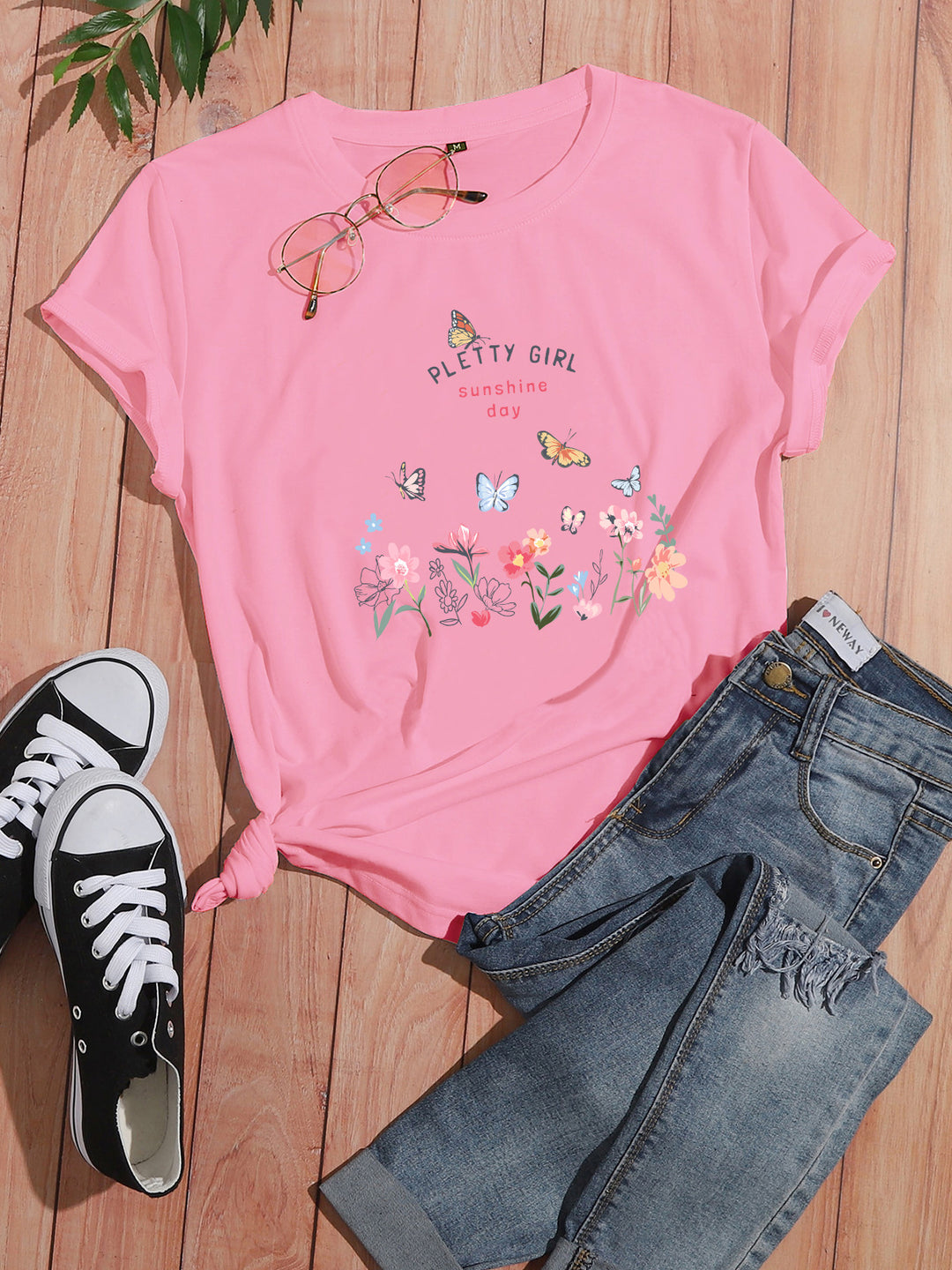 Kvinders t-shirt med legende blomsterprint og elegant print Stilla