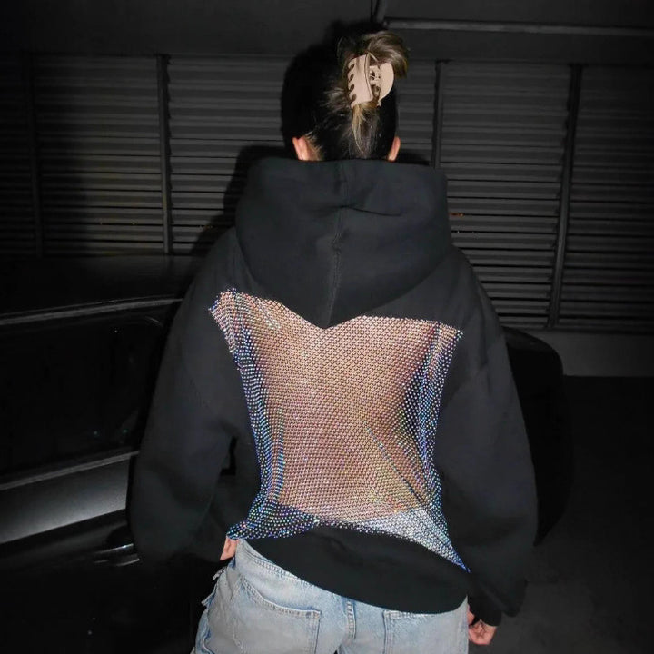Dame med hættesweatshirt med transparent broderet rygparti Skovae