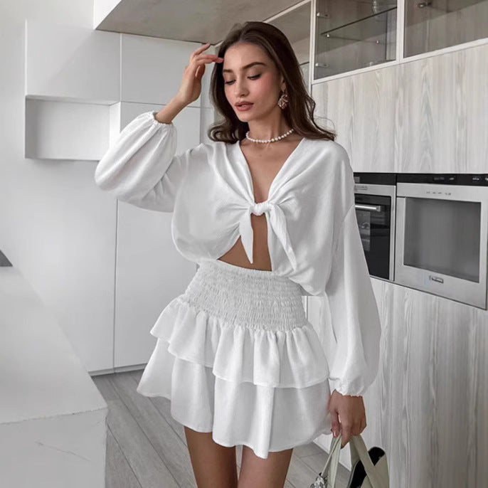 Damebluse med knude og flæse shorts Stilla