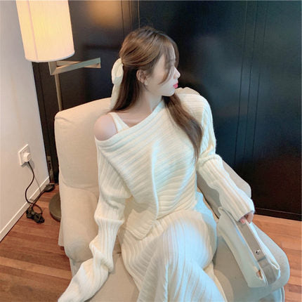 Kvinders elegante strikket sweater med off-shoulder design og fin ribbet tekstur Stilla