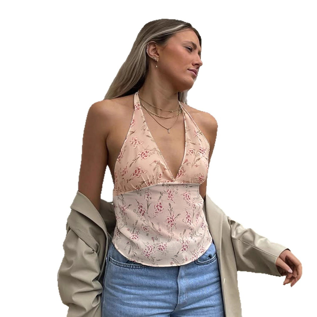 Dame halterneck top med blomstret design og dyb V-udskæring Skovae