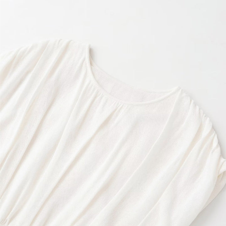 Dame mode oversized top med raffineret bånd Skovae