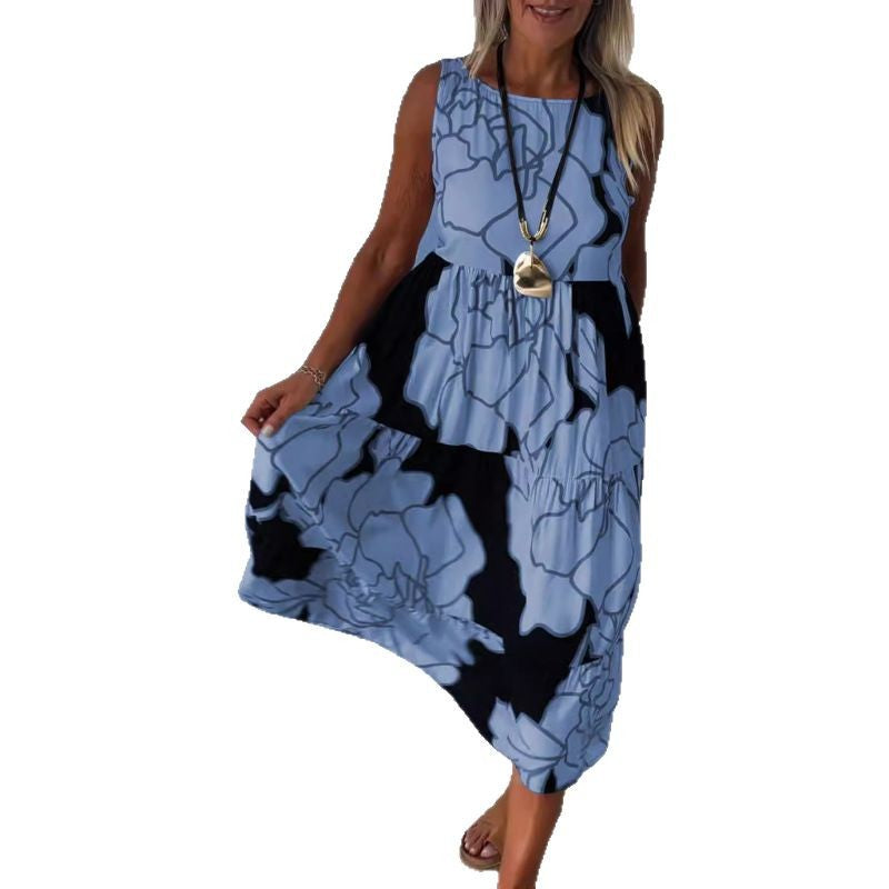 Dame Maxikjole med floral design og asymmetrisk kant Stilla