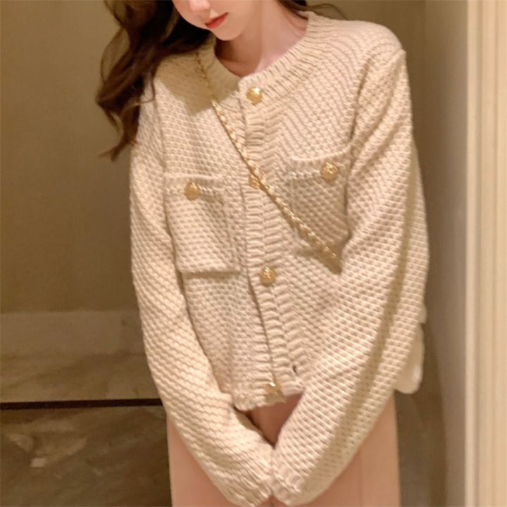 Kvinders cardigan med dekorative knapper og tekstureret design Stilla
