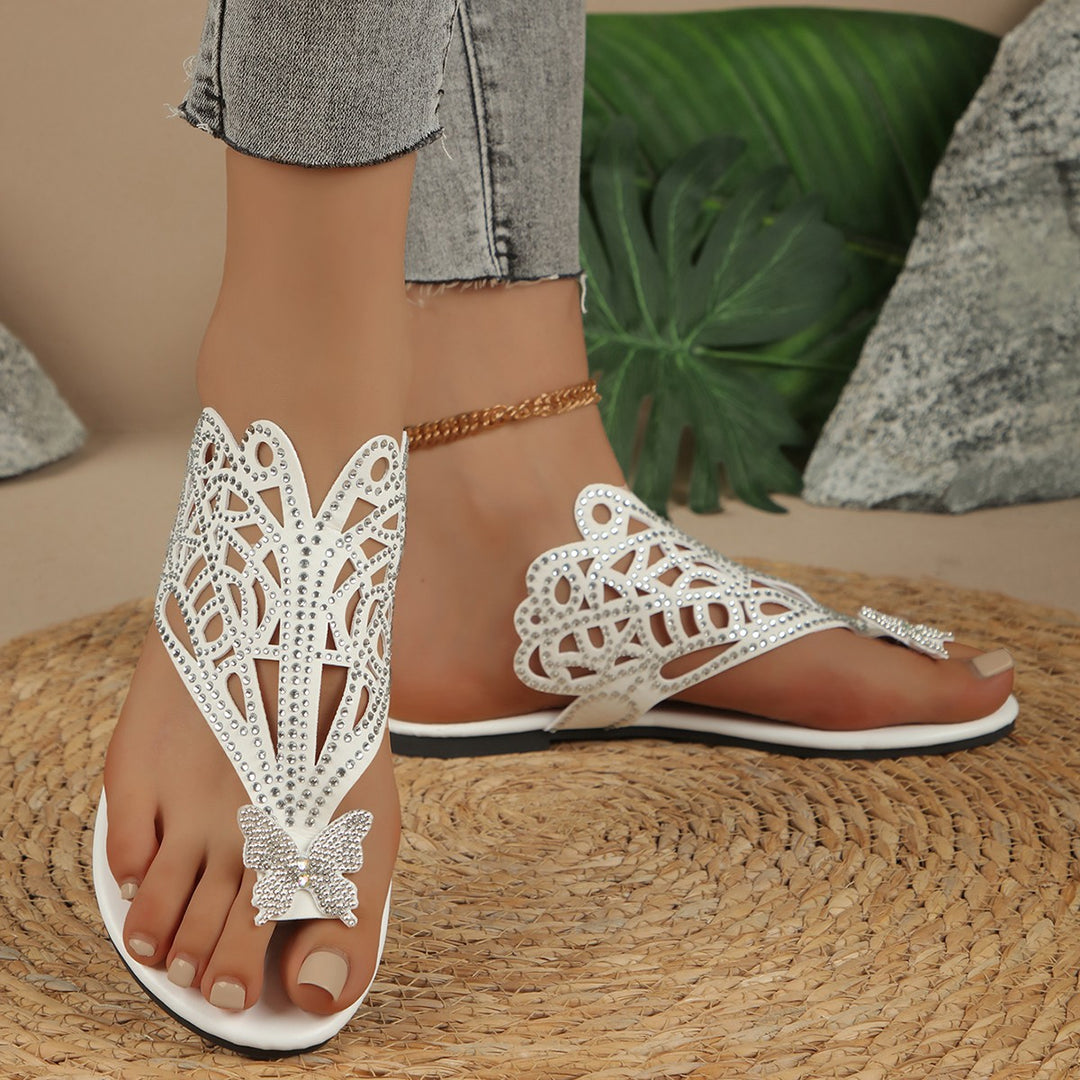 Dame Glitrende Pantoletten med filigran Sommerfugle-design og elegante Strass-applikationer Stilla