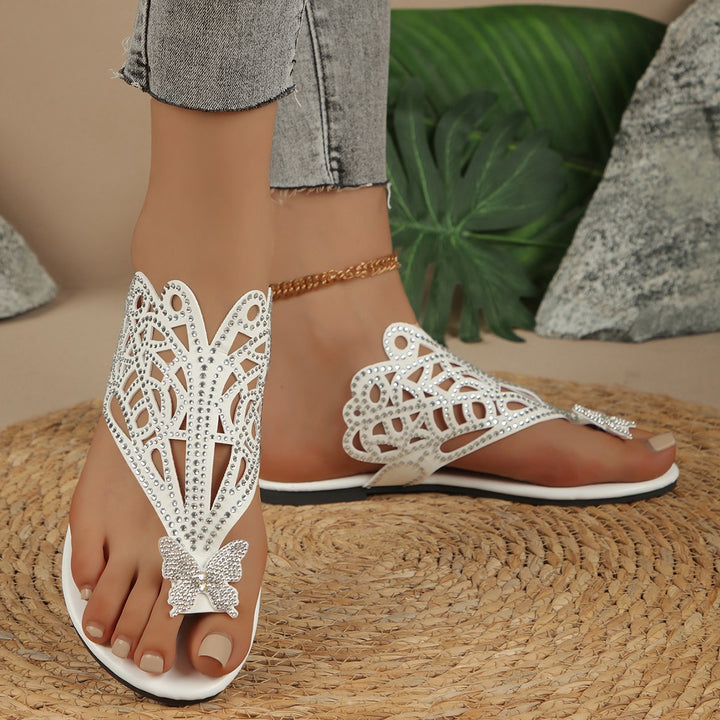 Dame Glitrende Pantoletten med filigran Sommerfugle-design og elegante Strass-applikationer Stilla