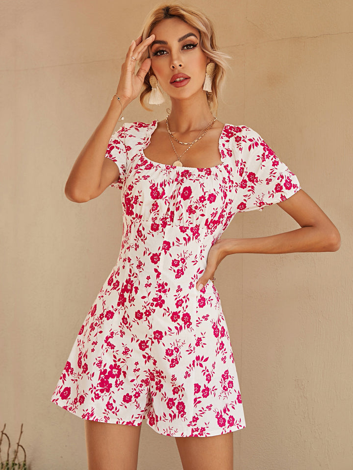 Dame Playsuit med blomsterdesign og feminine pufærmer Stilla