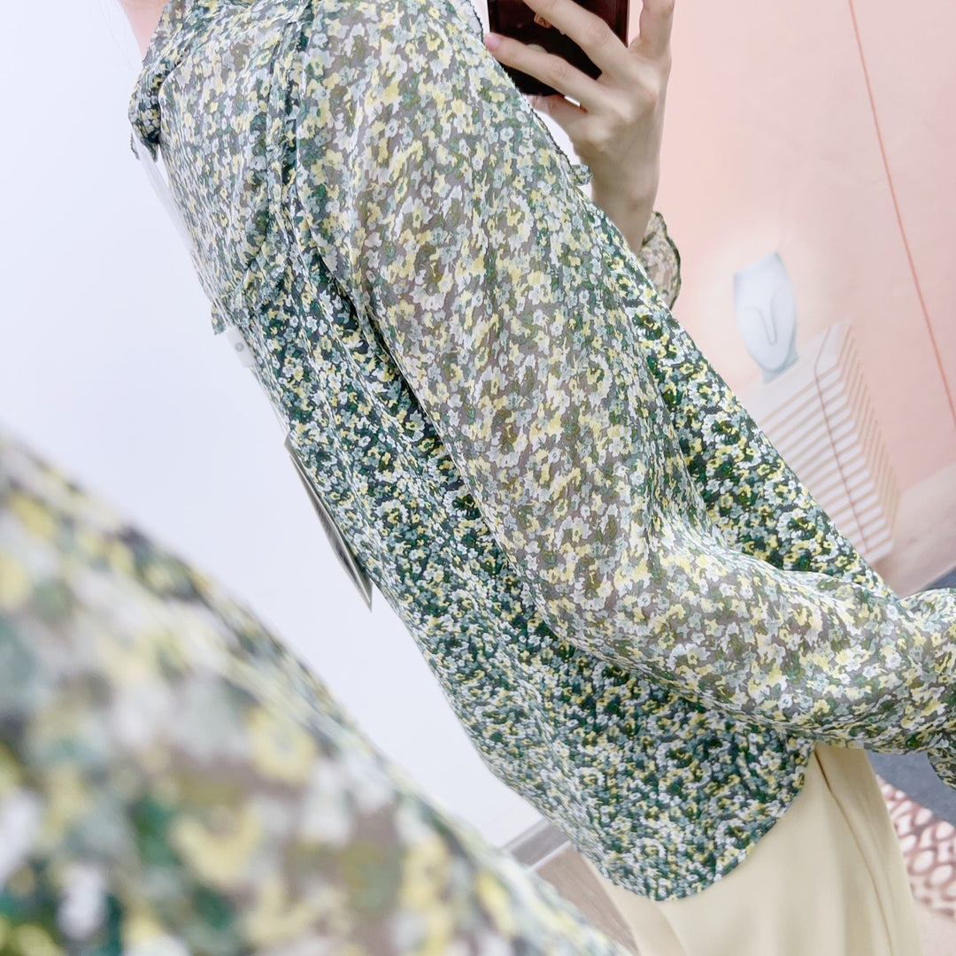 Dame Gennemsigtig Bluse med blomsterdesign og elegante flæsedetaljer Stilla