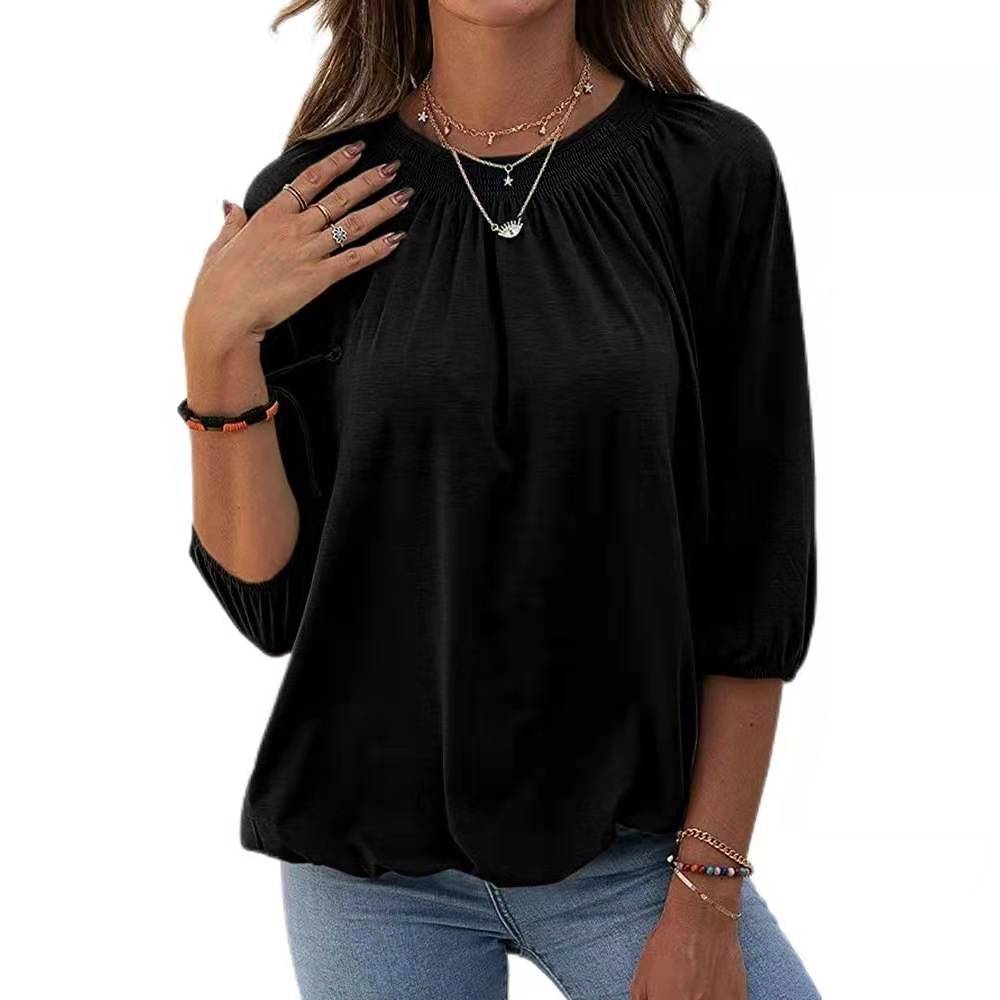 Dame afslappet bluse med casual snit og elastiske pufærmer Stilla