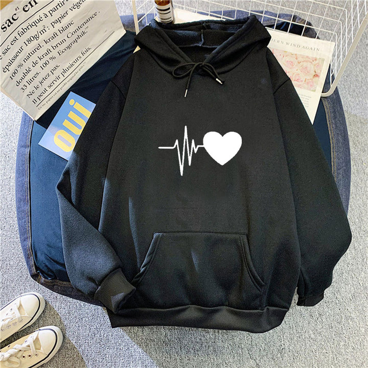 Dame hoodie med hjertevarmende design og hyggelig pasform Skovae