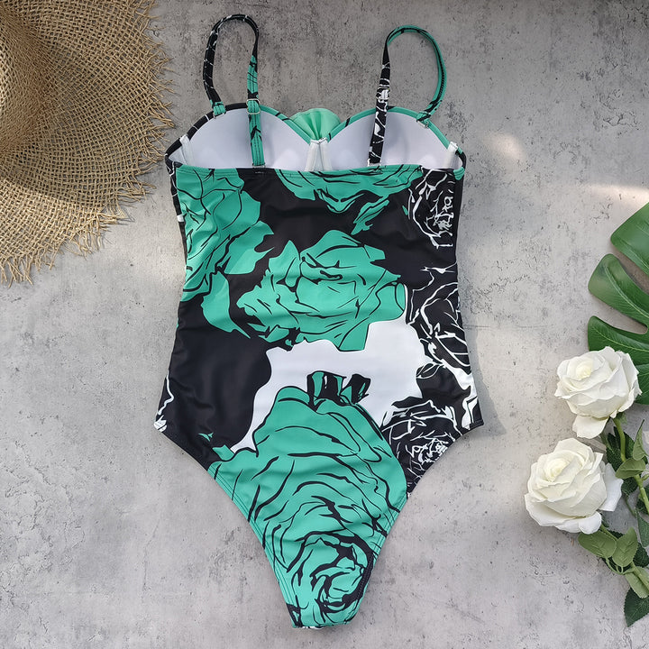 Dame badedragt med blomstret design og raffinerede stropdetaljer Stilla
