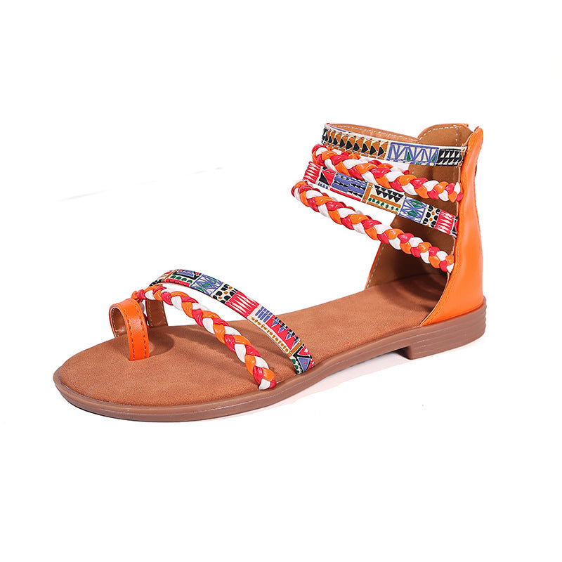 Dame fashionable badesandaler med flettede remme og farverig mønstermix Stilla