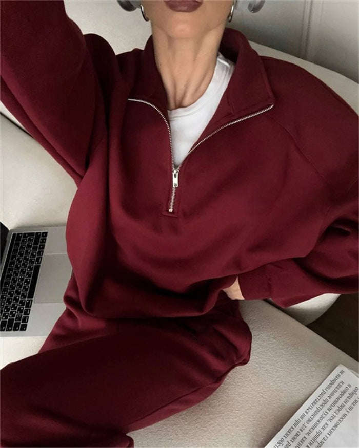 Dames sporty sweat sæt med halv lynlås og brede ben Skovae