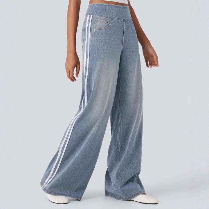 Damerne let baggy joggingbukser i jeanslook med elastisk komforttalje, sidelæssede kontraststriber og stiklommer Skovae