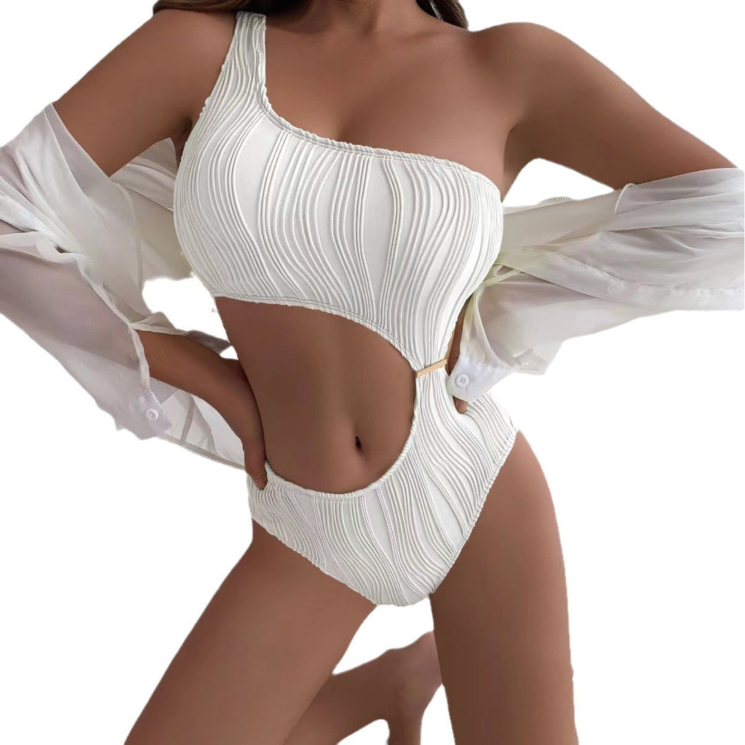 Dame Ensidig Badedragt med spændende Cut-Out-Design og elegant Ribbemønster Stilla