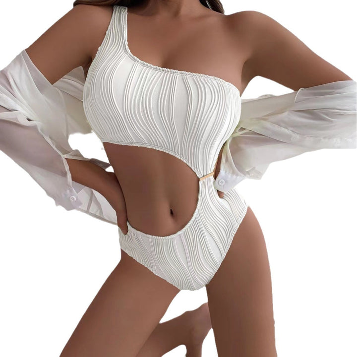 Dame Ensidig Badedragt med spændende Cut-Out-Design og elegant Ribbemønster Stilla