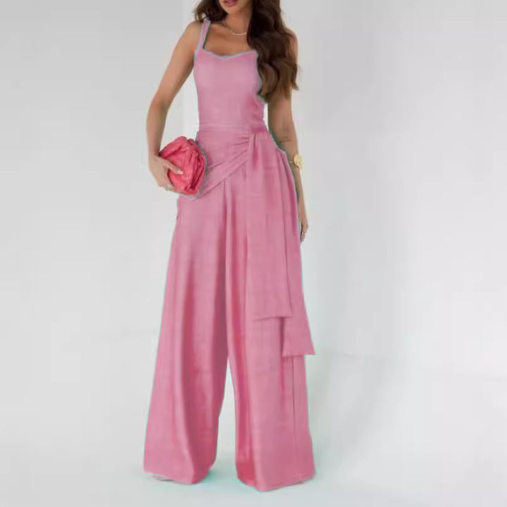 Dame bredt jumpsuit med elegante draperinger og stropper Stilla