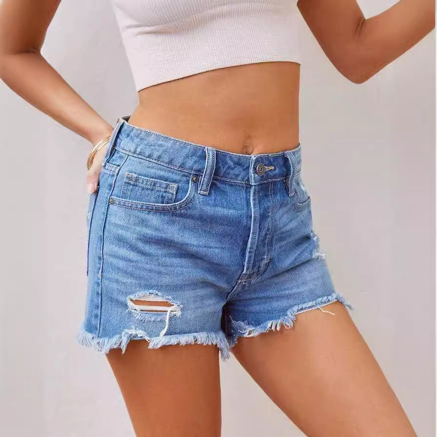 Dame jeansshorts i distressed look med frynset kant og høj talje Stilla