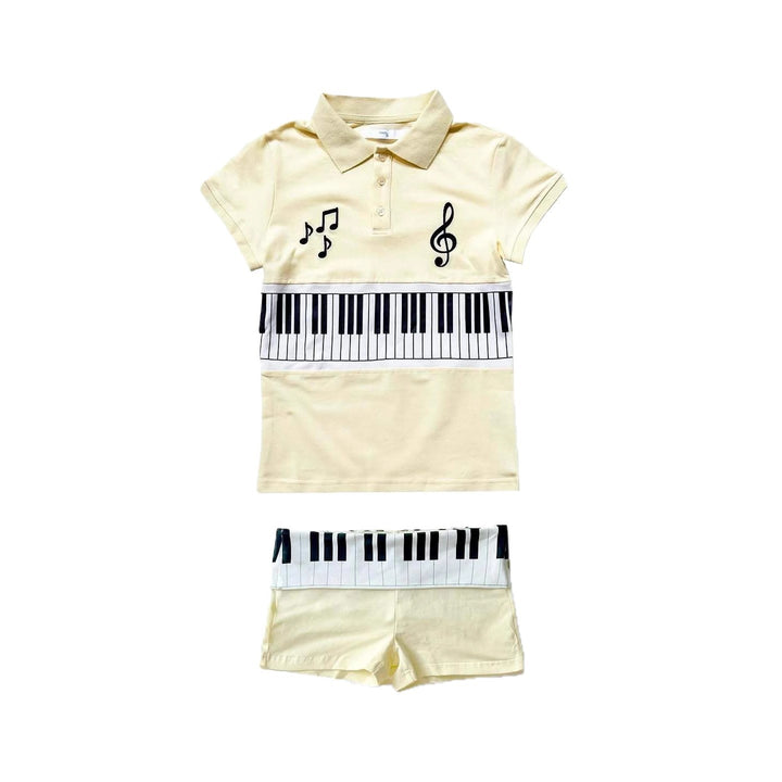 Dame polo shirt og shorts sæt med musikalsk design Skovae