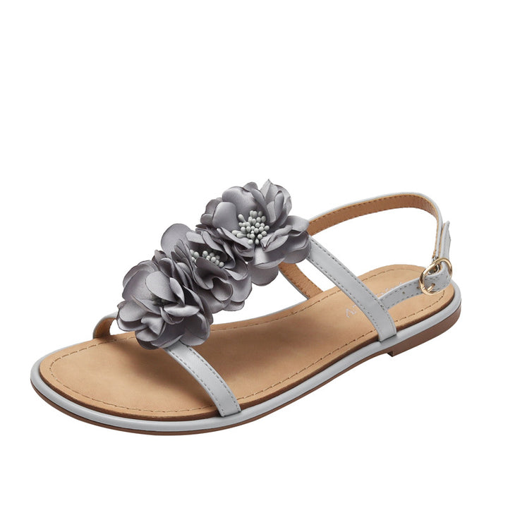 Dame sandaler med dekorativt blomsterdesign og fleksibel sål Stilla
