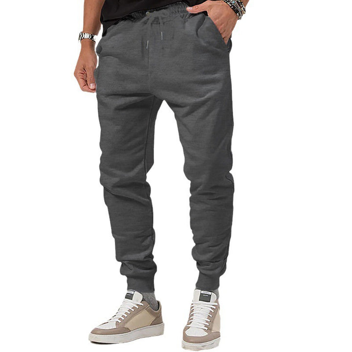 Herre nan Jersey-sweatpants i konisk snit med skjult snor og formstabile fodbånd Skovae