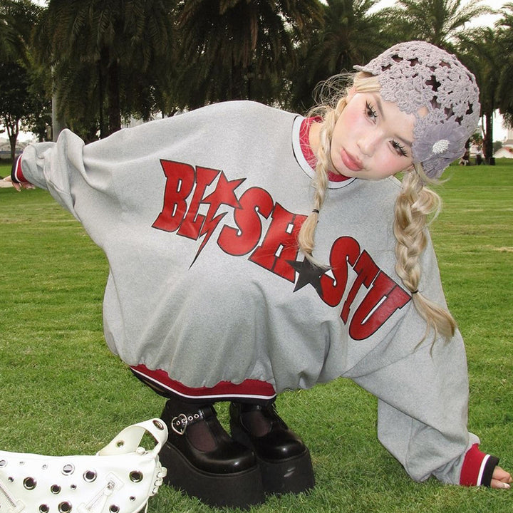 Dame Trendy Cropped Sweatshirt med iøjnefaldende print og ribbede afslutninger Stilla