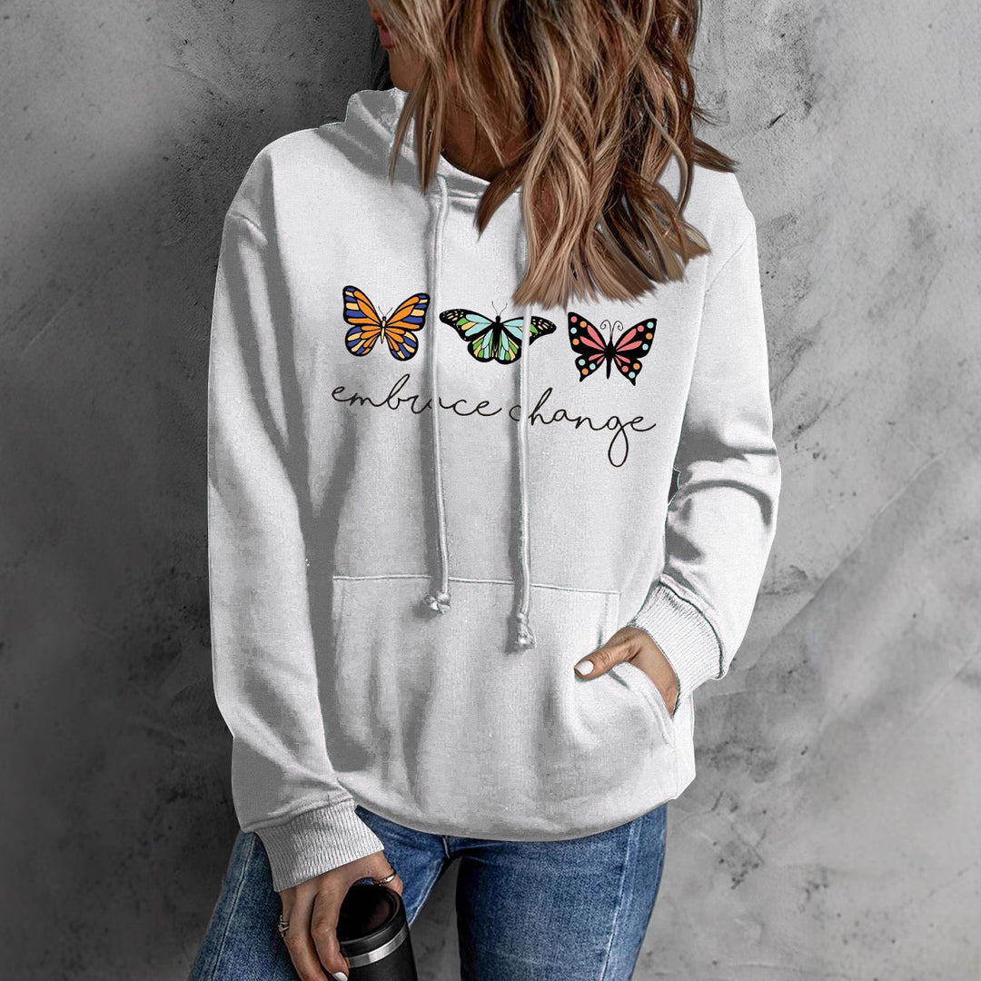 Dame hoodie med inspirerende sommerfuglemotiv og motiverende budskab Stilla