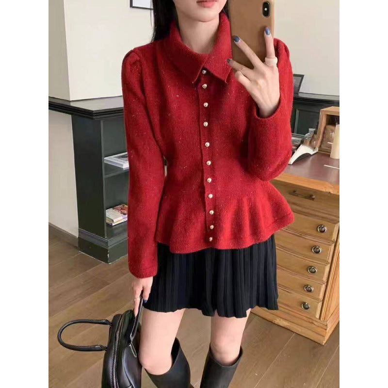 Kvinders peplum-top lavet af blødt strik med elegante knapper Stilla