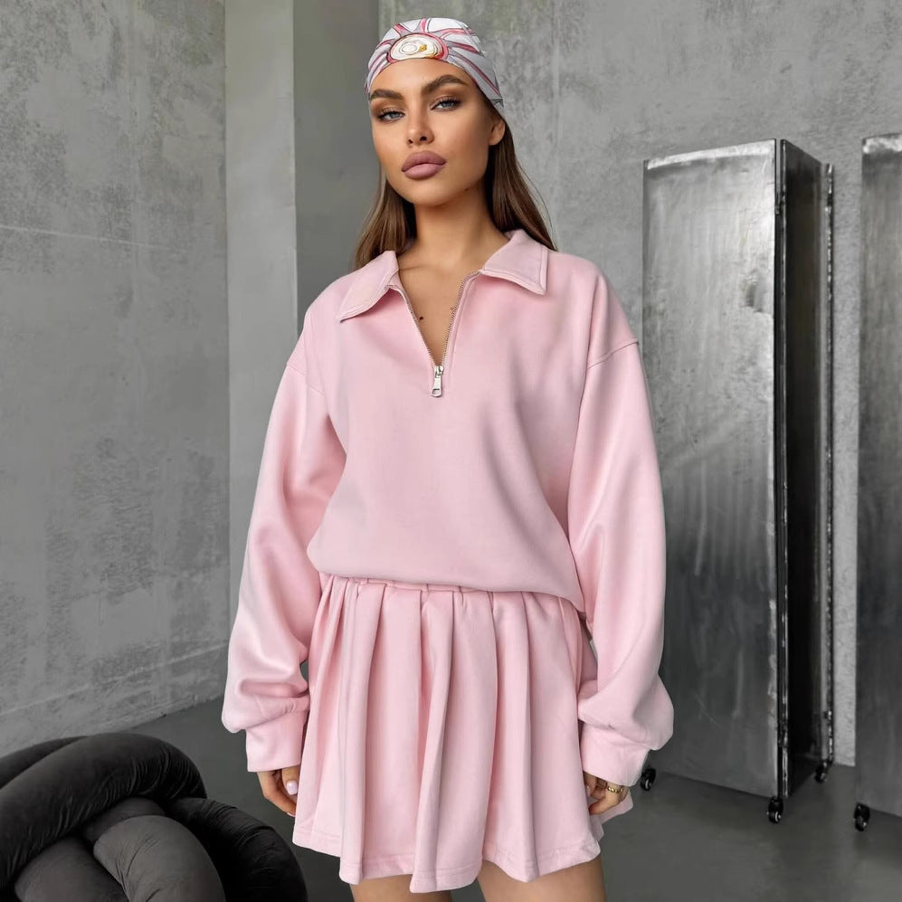 Dame sporty oversized pullover med kort lynlås og ribbede detaljer Skovae