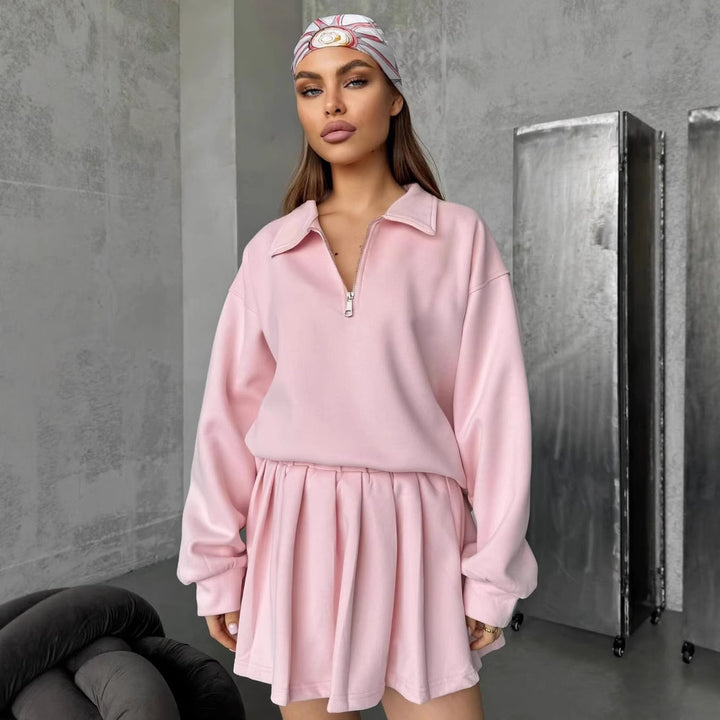 Dame sporty oversized pullover med kort lynlås og ribbede detaljer Skovae