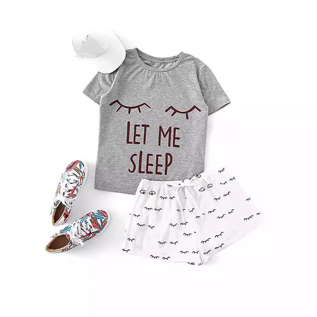 Dame pyjamaset med sjov print og komfortable shorts Stilla