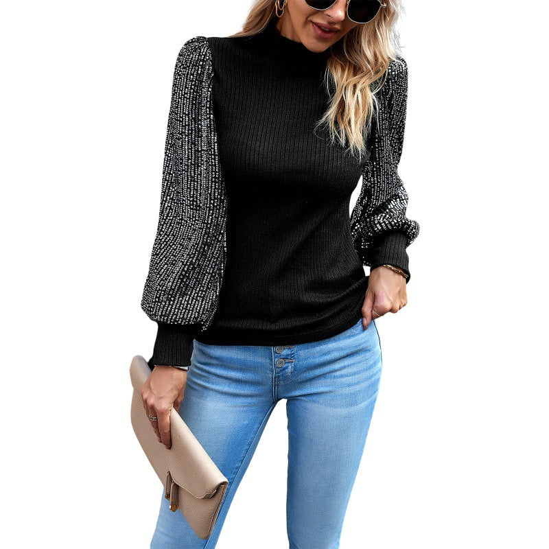 Dame Elegant top med fashionable puffærmer af netstof og fint ribdesign Stilla